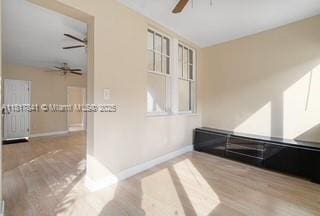 1416 N 2nd Ave N, Lake Worth, FL 33460 - unfurnished room with ceiling fan, baseboards, and wood finished floors