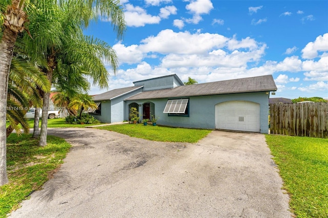 16040 SW 287th St, Homestead, FL 33033 - view of front of property with stucco siding, asphalt driveway, and an attached garage