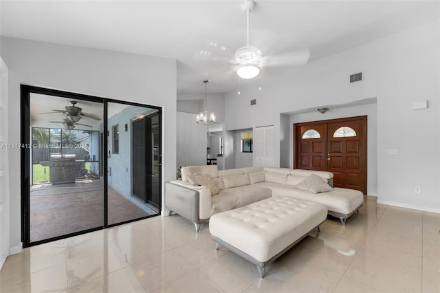 16040 SW 287th St, Homestead, FL 33033 - living area featuring ceiling fan, baseboards, a chandelier, and a high ceiling