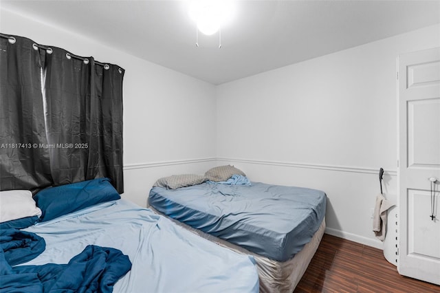 16040 SW 287th St, Homestead, FL 33033 - bedroom with wood finished floors and baseboards