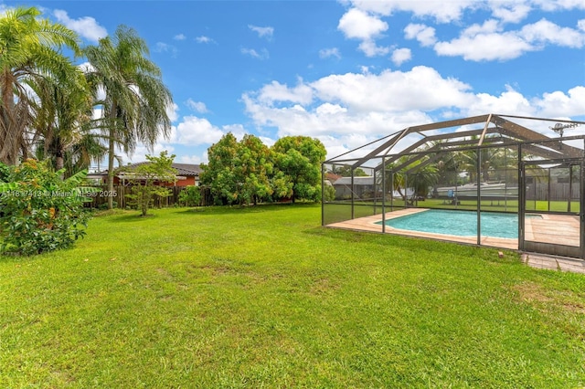 16040 SW 287th St, Homestead, FL 33033 - view of grassy yard with an outdoor pool and a lanai