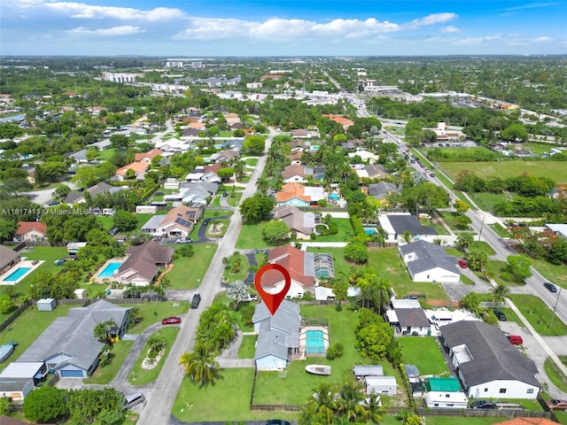 16040 SW 287th St, Homestead, FL 33033 - aerial view of property's location featuring a pool and nearby suburban area