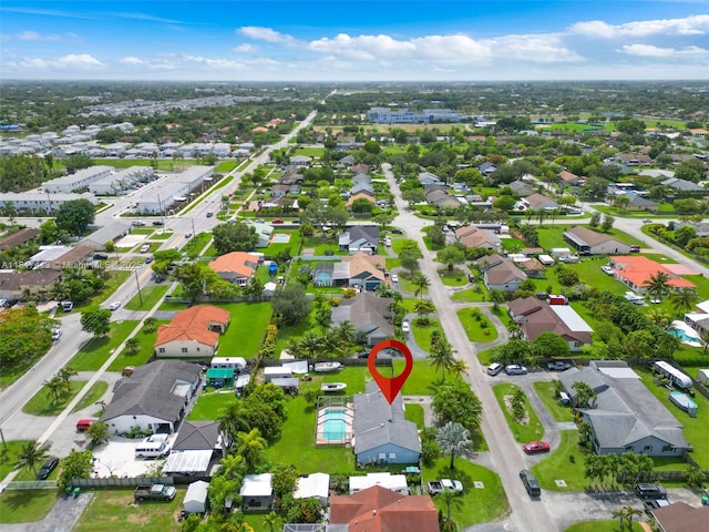 16040 SW 287th St, Homestead, FL 33033 - aerial view of property and surrounding area featuring nearby suburban area