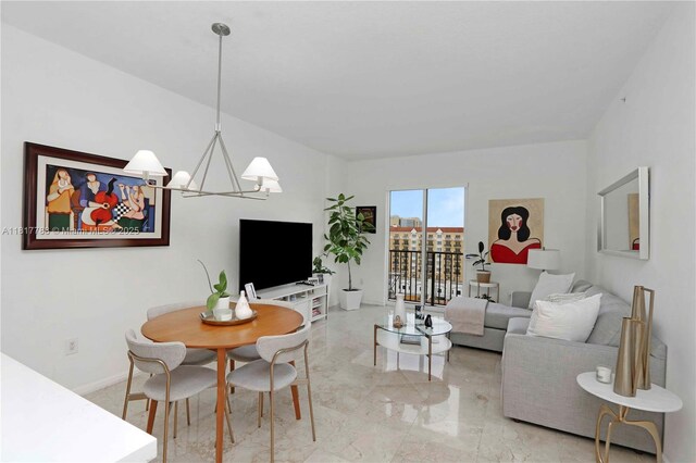 10 Aragon Ave Unit 919, Coral Gables, FL 33134 - living room with light marble finish flooring and a chandelier