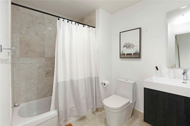 10 Aragon Ave Unit 919, Coral Gables, FL 33134 - bathroom featuring vanity, toilet, and shower / bath combo with shower curtain
