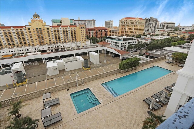 10 Aragon Ave Unit 919, Coral Gables, FL 33134 - view of swimming pool featuring a city view