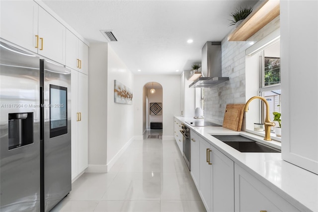6301 Lake Geneva Rd, Miami Lakes, FL 33014 - kitchen with stainless steel fridge with ice dispenser, island exhaust hood, a sink, tasteful backsplash, and wall oven