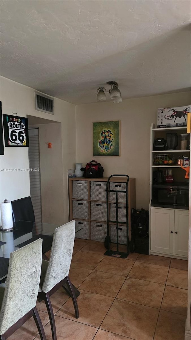 13655 NE 10th Ave Unit 108, North Miami, FL 33161 - home office with light tile patterned floors