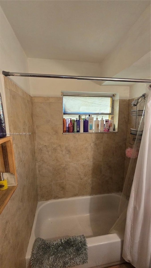 13655 NE 10th Ave Unit 108, North Miami, FL 33161 - bathroom featuring shower / bath combination with curtain