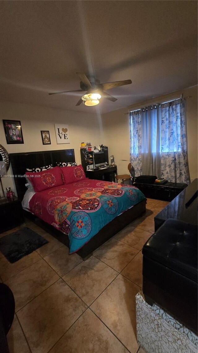 13655 NE 10th Ave Unit 108, North Miami, FL 33161 - tiled bedroom with ceiling fan