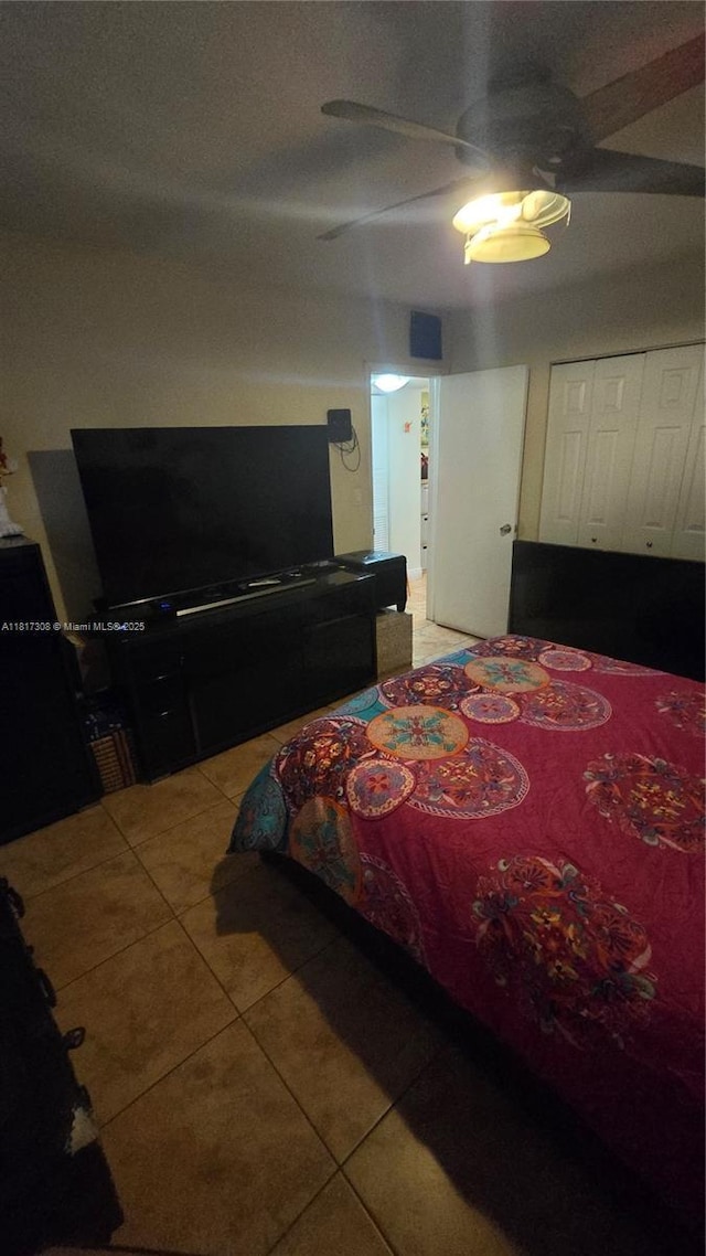 13655 NE 10th Ave Unit 108, North Miami, FL 33161 - tiled bedroom with ceiling fan