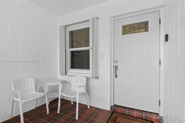 3810 Rowena Cir, West Palm Beach, FL 33417 - view of exterior entry featuring concrete block siding