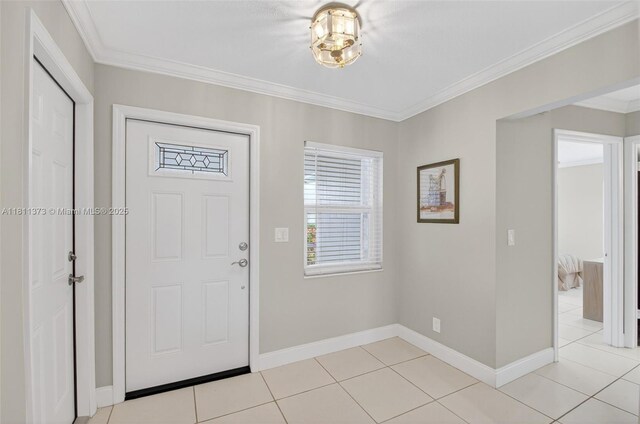 3810 Rowena Cir, West Palm Beach, FL 33417 - entrance foyer with ornamental molding, light tile patterned floors, and baseboards