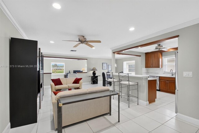 3810 Rowena Cir, West Palm Beach, FL 33417 - living area with a ceiling fan, baseboards, ornamental molding, recessed lighting, and light tile patterned floors