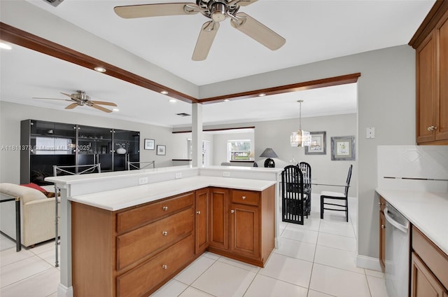 3810 Rowena Cir, West Palm Beach, FL 33417 - kitchen featuring dishwasher, open floor plan, a ceiling fan, light countertops, and brown cabinets