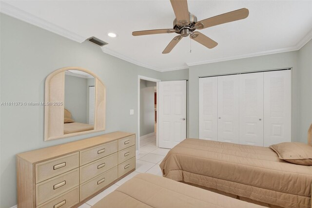 3810 Rowena Cir, West Palm Beach, FL 33417 - bedroom with ornamental molding, light tile patterned flooring, a closet, a ceiling fan, and recessed lighting