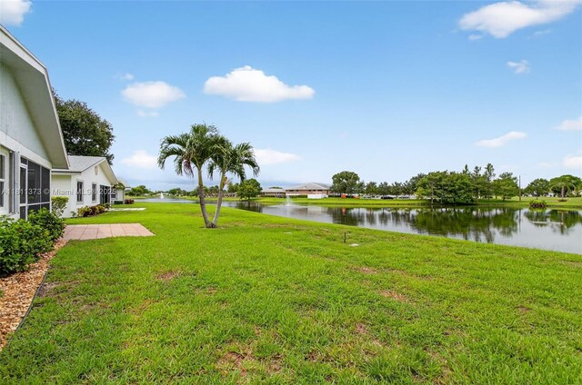 3810 Rowena Cir, West Palm Beach, FL 33417 - view of green lawn featuring a water view
