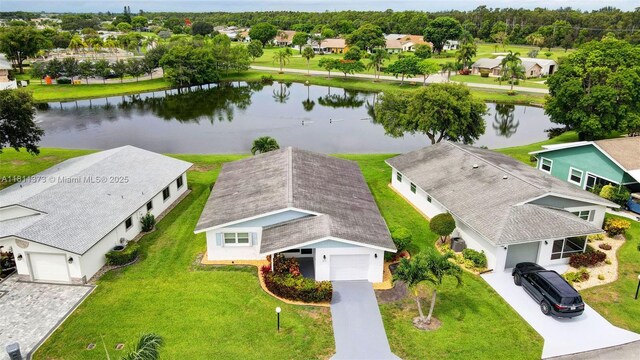 3810 Rowena Cir, West Palm Beach, FL 33417 - aerial view of residential area featuring a nearby body of water