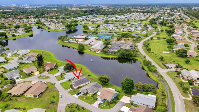 3810 Rowena Cir, West Palm Beach, FL 33417 - aerial view of property's location with a nearby body of water and nearby suburban area