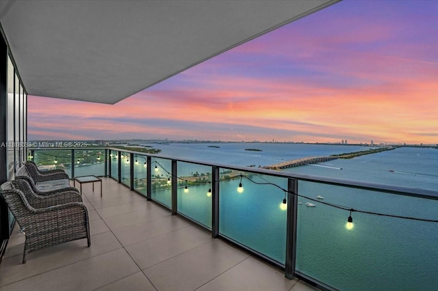 3131 NE 7th Ave Unit 3306, Miami, FL 33137 - balcony at dusk featuring a water view