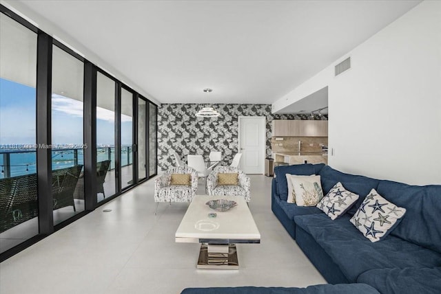 3131 NE 7th Ave Unit 3306, Miami, FL 33137 - living room with wallpapered walls