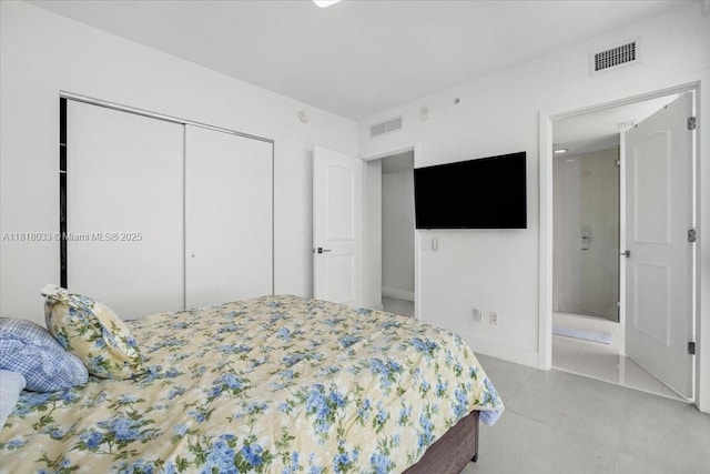 3131 NE 7th Ave Unit 3306, Miami, FL 33137 - tiled bedroom with a closet and ensuite bath