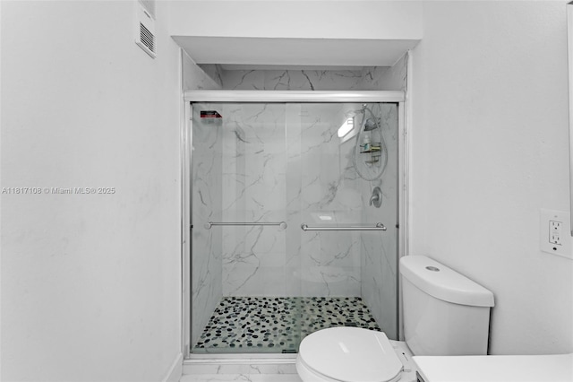 10441 SW 156th Ct Unit 4210, Miami, FL 33196 - bathroom featuring marble finish floors, toilet, and a marble finish shower