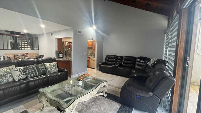 11040 S Lakeview Dr, Pembroke Pines, FL 33026 - living room featuring healthy amount of natural light and light tile patterned flooring
