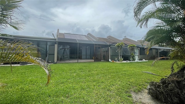 11040 S Lakeview Dr, Pembroke Pines, FL 33026 - rear view of house with a yard, a lanai, and a patio