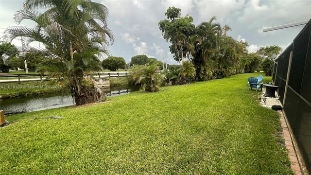 11040 S Lakeview Dr, Pembroke Pines, FL 33026 - view of yard featuring a water view