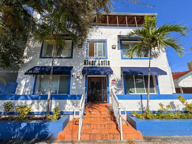 1021 NW 3rd St Unit 206, Miami, FL 33128 - view of front facade with stucco siding