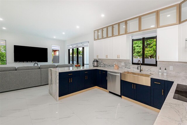 18250 SW 152nd Ave, Miami, FL 33187 - kitchen featuring stainless steel dishwasher, light marble finish floors, blue cabinets, a peninsula, and a sink