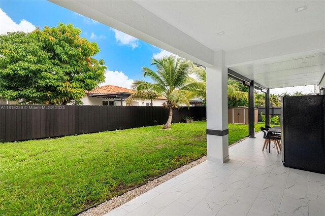 18250 SW 152nd Ave, Miami, FL 33187 - view of yard featuring a patio area