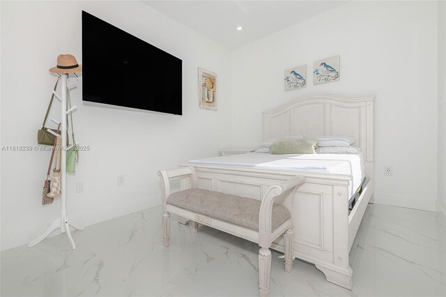 18250 SW 152nd Ave, Miami, FL 33187 - bedroom featuring light marble finish floors and baseboards