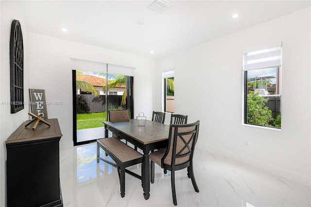 18250 SW 152nd Ave, Miami, FL 33187 - dining room featuring light marble finish flooring, baseboards, and recessed lighting