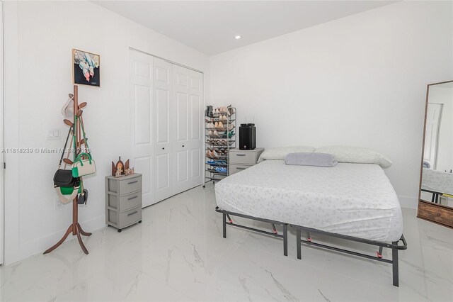 18250 SW 152nd Ave, Miami, FL 33187 - bedroom with a closet, marble finish flooring, and recessed lighting