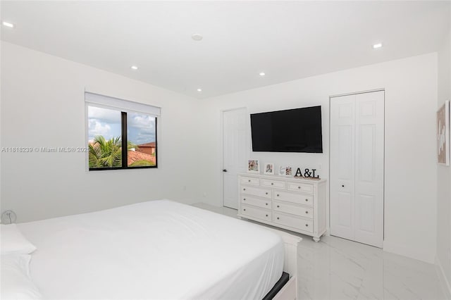 18250 SW 152nd Ave, Miami, FL 33187 - bedroom featuring light marble finish floors, recessed lighting, a closet, and baseboards