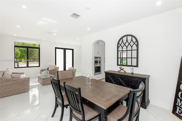 18250 SW 152nd Ave, Miami, FL 33187 - dining area with light marble finish floors, recessed lighting, and baseboards