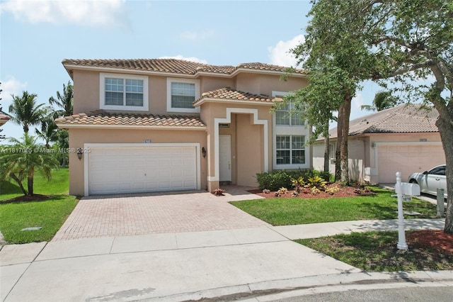 16710 NW 12th St, Pembroke Pines, FL 33028 - mediterranean / spanish-style home featuring decorative driveway, a tile roof, stucco siding, and a front yard