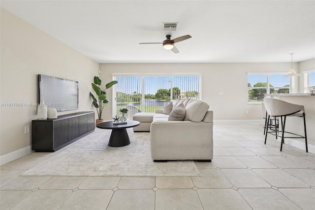 16710 NW 12th St, Pembroke Pines, FL 33028 - living room featuring healthy amount of natural light and ceiling fan