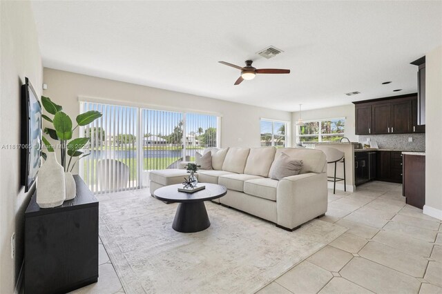 16710 NW 12th St, Pembroke Pines, FL 33028 - living room with a ceiling fan and light tile patterned floors