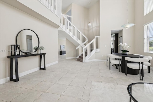 16710 NW 12th St, Pembroke Pines, FL 33028 - entrance foyer featuring stairway and a towering ceiling