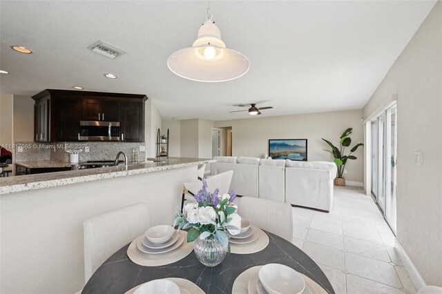 16710 NW 12th St, Pembroke Pines, FL 33028 - dining space with a ceiling fan, light tile patterned floors, and recessed lighting