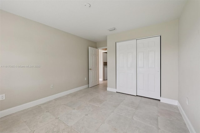 16710 NW 12th St, Pembroke Pines, FL 33028 - unfurnished bedroom with a closet and light tile patterned flooring