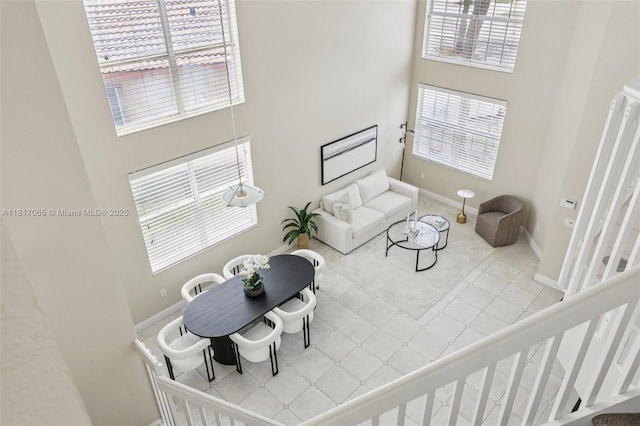 16710 NW 12th St, Pembroke Pines, FL 33028 - living room featuring plenty of natural light, a high ceiling, and tile patterned flooring