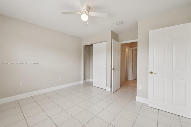 16710 NW 12th St, Pembroke Pines, FL 33028 - unfurnished bedroom featuring a closet, light tile patterned floors, and a ceiling fan