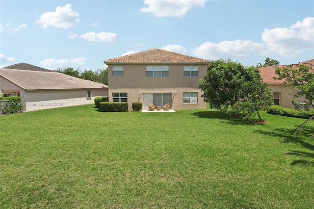 16710 NW 12th St, Pembroke Pines, FL 33028 - back of property featuring a yard, stucco siding, and a tile roof