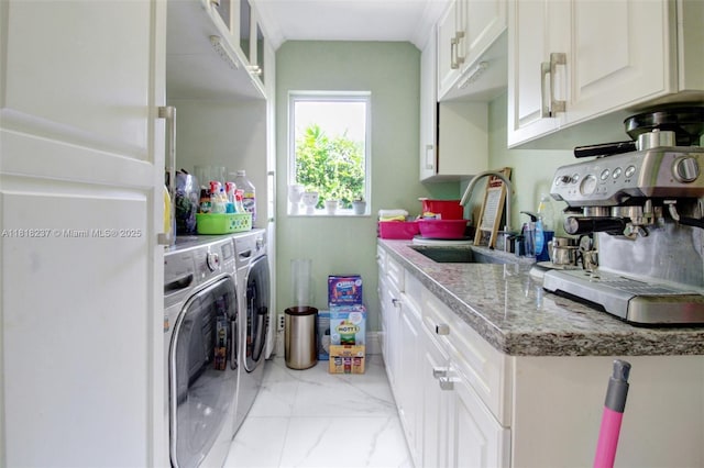 3736 SW 107th Ct, Miami, FL 33165 - laundry area with washer and clothes dryer and light marble finish flooring