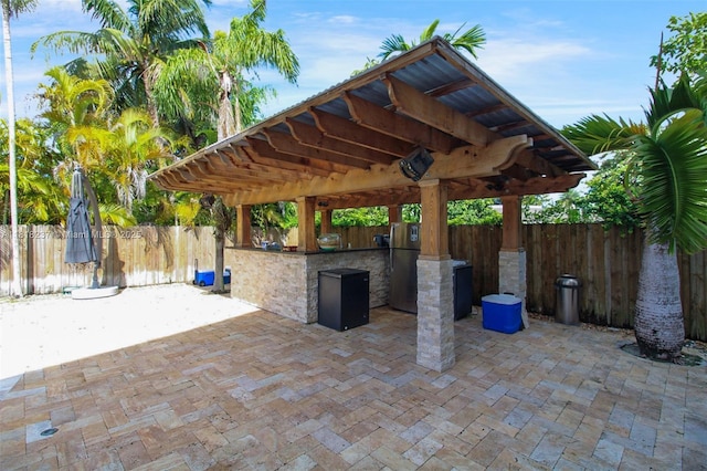 3736 SW 107th Ct, Miami, FL 33165 - view of patio / terrace featuring an outdoor kitchen and a gazebo