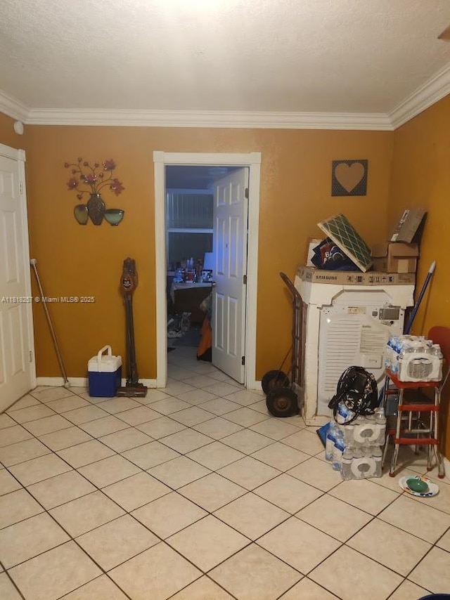 401 SE 4th St, Deerfield Beach, FL 33441 - unfurnished dining area with crown molding and light tile patterned floors